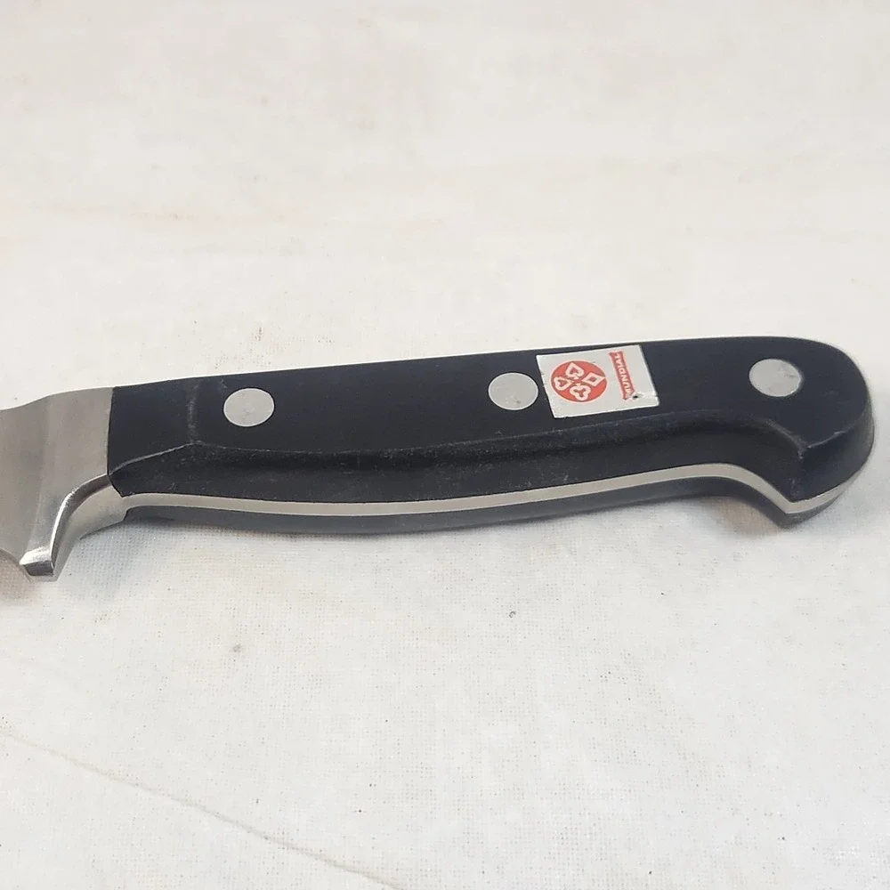 Mundial 5114-6 Boning Knife Stainless Steel Brazil Black Handle Full Tang Rivet